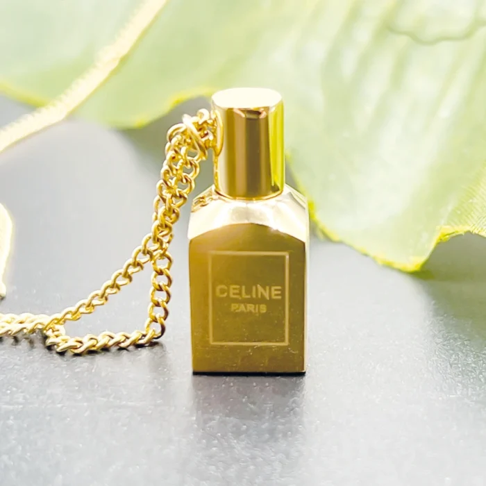 NEFERU CELINE Mini Scent Bottle Pendant – Gold Statement Chain - Image 1
